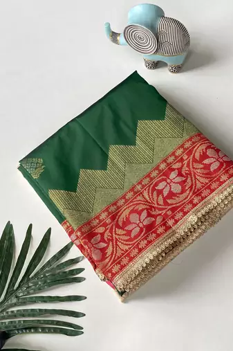 dark green color zari weaves contrast pallu and designer chaap border silk blend saree