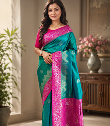 emerald green color zari weaves contrast pallu and designer chaap border silk blend saree