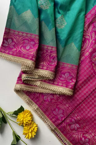 emerald green color zari weaves contrast pallu and designer chaap border silk blend saree