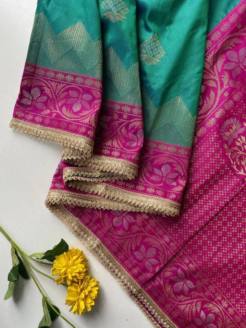 emerald green color zari weaves contrast pallu and designer chaap border silk blend saree
