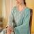 Sea green faux georgette readymade embroidered palazzo suit