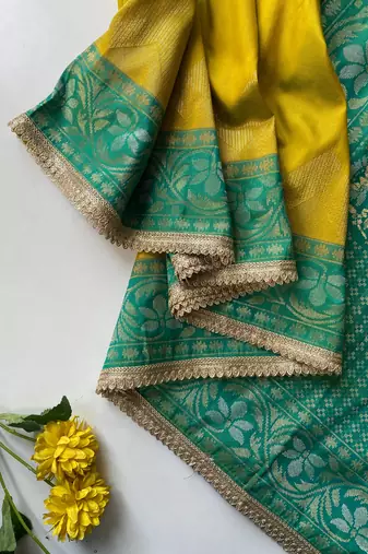 mustard yellow color zari weaves contrast pallu and designer chaap border silk blend saree