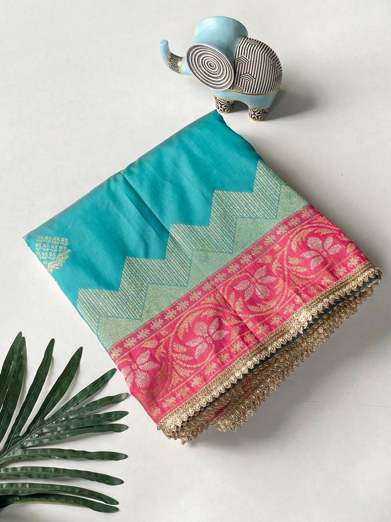 green color zari weaves contrast pallu and designer chaap border silk blend saree