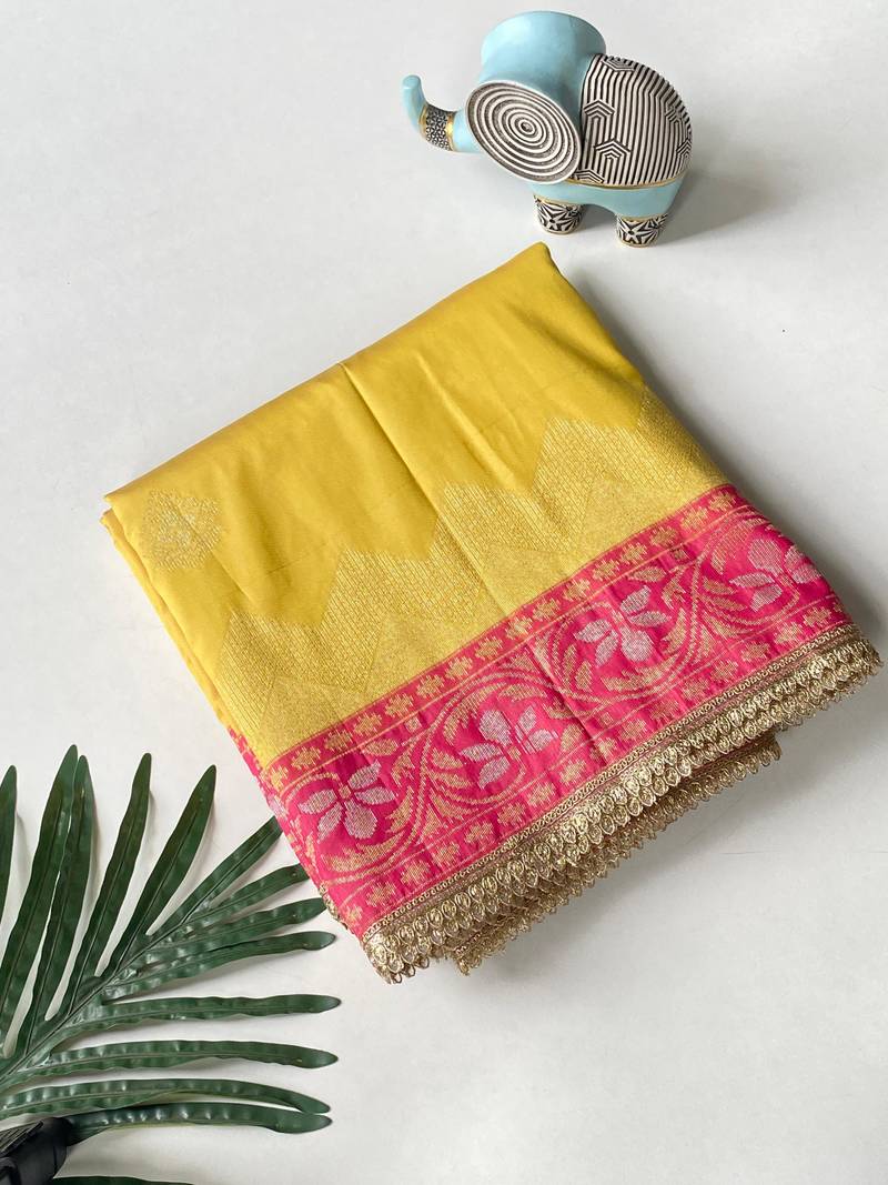 yellow color zari weaves contrast pallu and designer chaap border silk blend saree