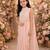 Peach pink embroidered georgette drape saree set