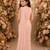 Peach pink embroidered georgette drape saree set