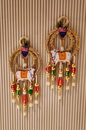 handmade cow wall hanging for home temple and festive decoration pack of 2