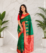 dark green color contrast weaving pallu and border kanchi weaving buttis on border silk blend saree