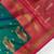dark green color contrast weaving pallu and border kanchi weaving buttis on border silk blend saree