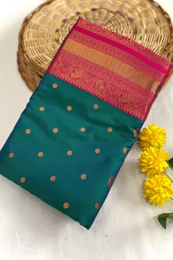dark green color contrast weaving pallu and border kanchi weaving buttis on border silk blend saree