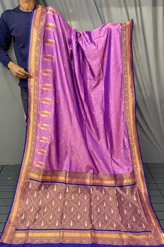 lavender color contrast weaving pallu and border kanchi weaving buttis on border silk blend saree