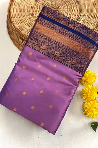 lavender color contrast weaving pallu and border kanchi weaving buttis on border silk blend saree