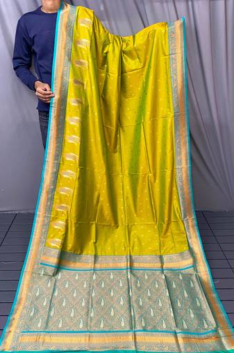 olive green color contrast weaving pallu and border kanchi weaving buttis on border silk blend saree