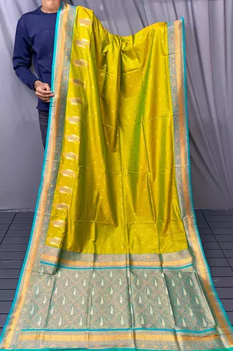 olive green color contrast weaving pallu and border kanchi weaving buttis on border silk blend saree