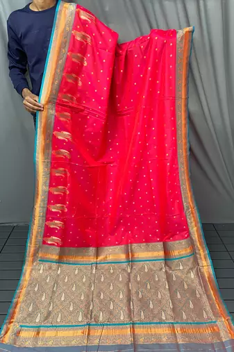 rani pink color contrast weaving pallu and border kanchi weaving buttis on border silk blend saree