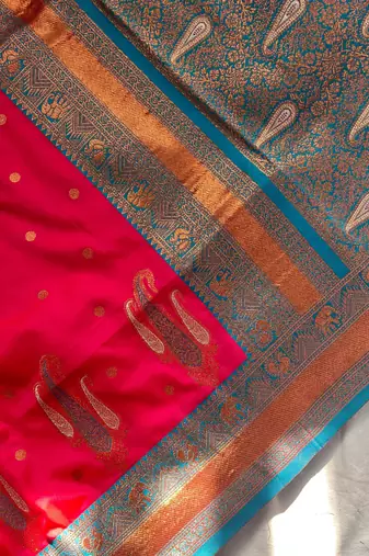 rani pink color contrast weaving pallu and border kanchi weaving buttis on border silk blend saree