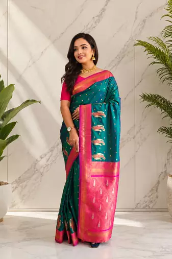 teal color contrast weaving pallu and border kanchi weaving buttis on border silk blend saree