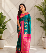 teal color contrast weaving pallu and border kanchi weaving buttis on border silk blend saree