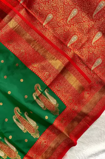 teal color contrast weaving pallu and border kanchi weaving buttis on border silk blend saree