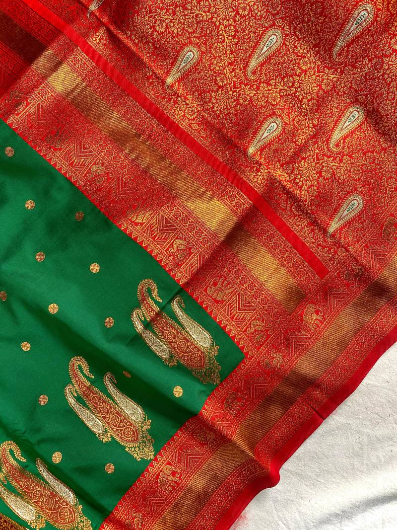 teal color contrast weaving pallu and border kanchi weaving buttis on border silk blend saree