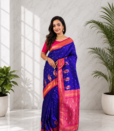 violet color contrast weaving pallu and border kanchi weaving buttis on border silk blend saree