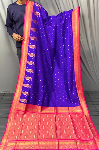 violet color contrast weaving pallu and border kanchi weaving buttis on border silk blend saree