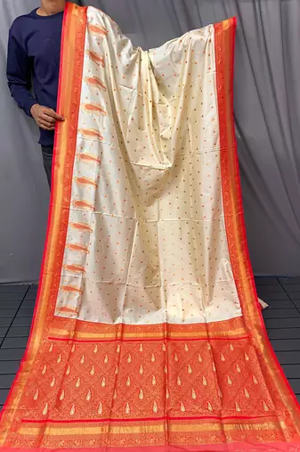 white color contrast weaving pallu and border kanchi weaving buttis on border silk blend saree