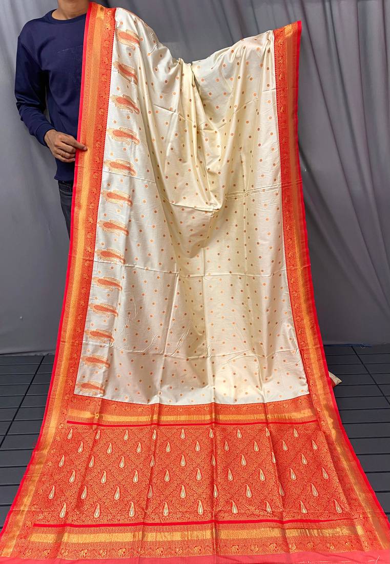white color contrast weaving pallu and border kanchi weaving buttis on border silk blend saree