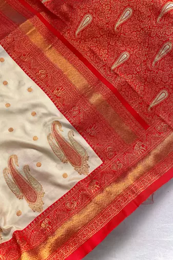 white color contrast weaving pallu and border kanchi weaving buttis on border silk blend saree