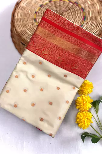 white color contrast weaving pallu and border kanchi weaving buttis on border silk blend saree