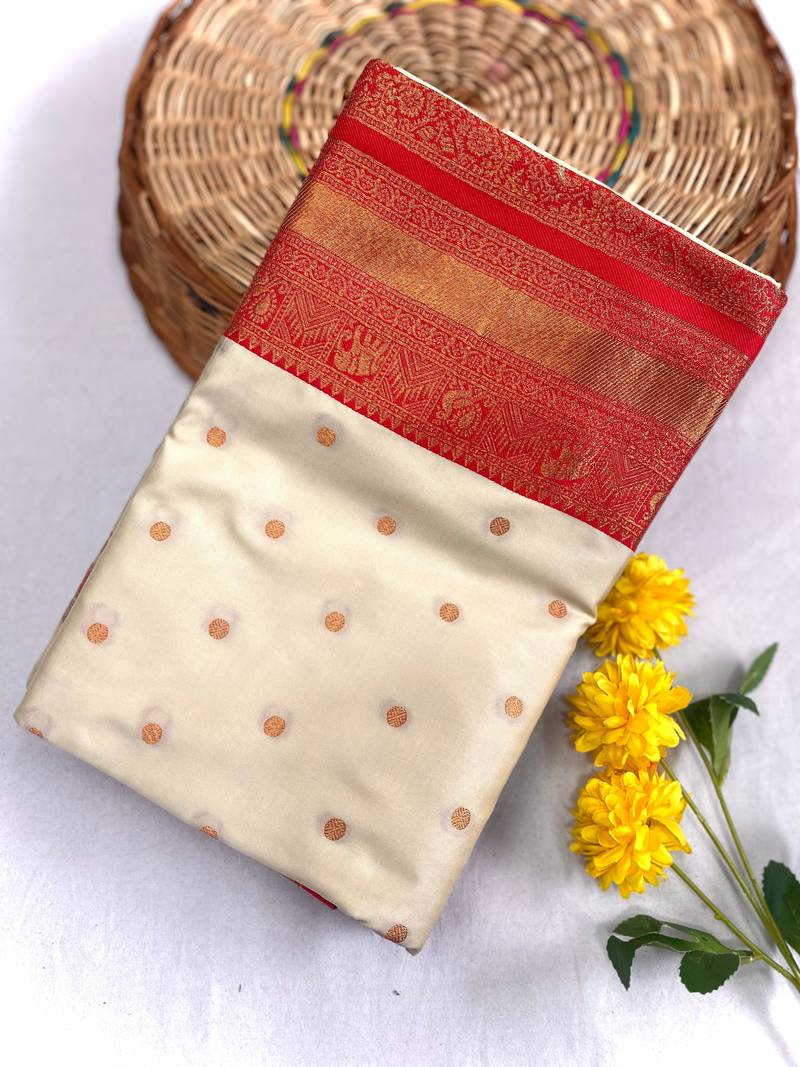 white color contrast weaving pallu and border kanchi weaving buttis on border silk blend saree