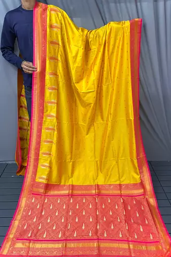 yellow color contrast weaving pallu and border kanchi weaving buttis on border silk blend saree