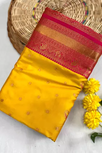 yellow color contrast weaving pallu and border kanchi weaving buttis on border silk blend saree
