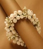 Traditional white jasmine mogra gajra hair accessory with gold touches