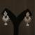 Oxidized silver crescent jhumka earrings with black bead accents