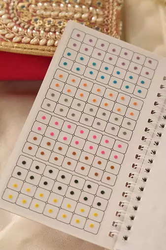 Multi-color & maroon assorted bindi booklet collection