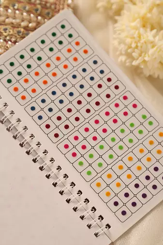Multi-color & maroon assorted bindi booklet collection