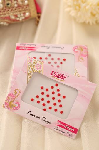 Classic red round kumkum bindi pack for traditional indian wear