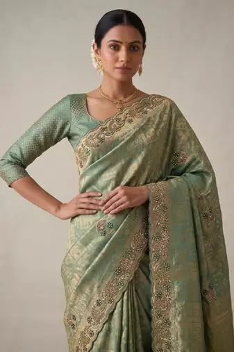 enthralling sea-green embroidery work with real bits work banarasi silk blend latest designer indian saree