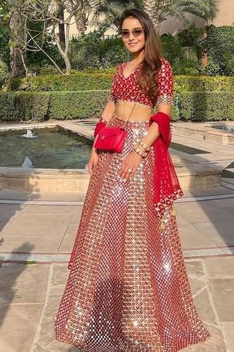 Red faux georgette sequin lehenga choli set and blush floral embroidered indian wedding wear for bridesmaids & mehendi