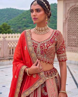 orange silk blend embroidered bridal lehenga choli 2