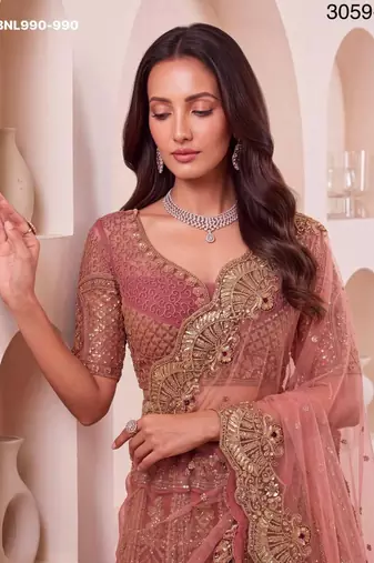 pink net embroidered wedding lehenga choli
