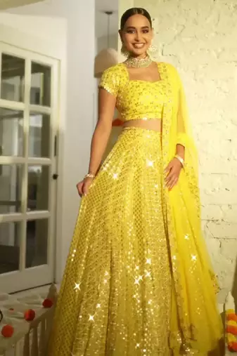 Radiant yellow Intricate 9MM sequin & zari embroidered Faux Georgette designer Wedding Haldi Ceremony lehenga choli set