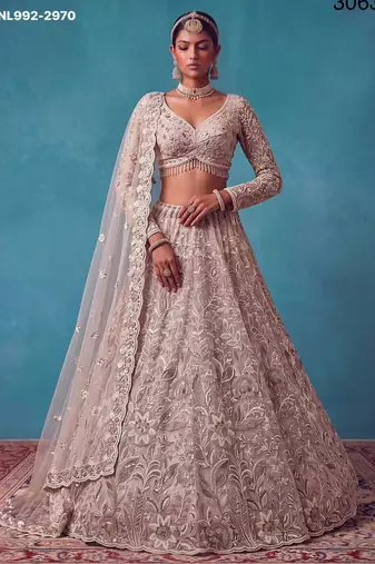 pink net embroidered bridal lehenga choli