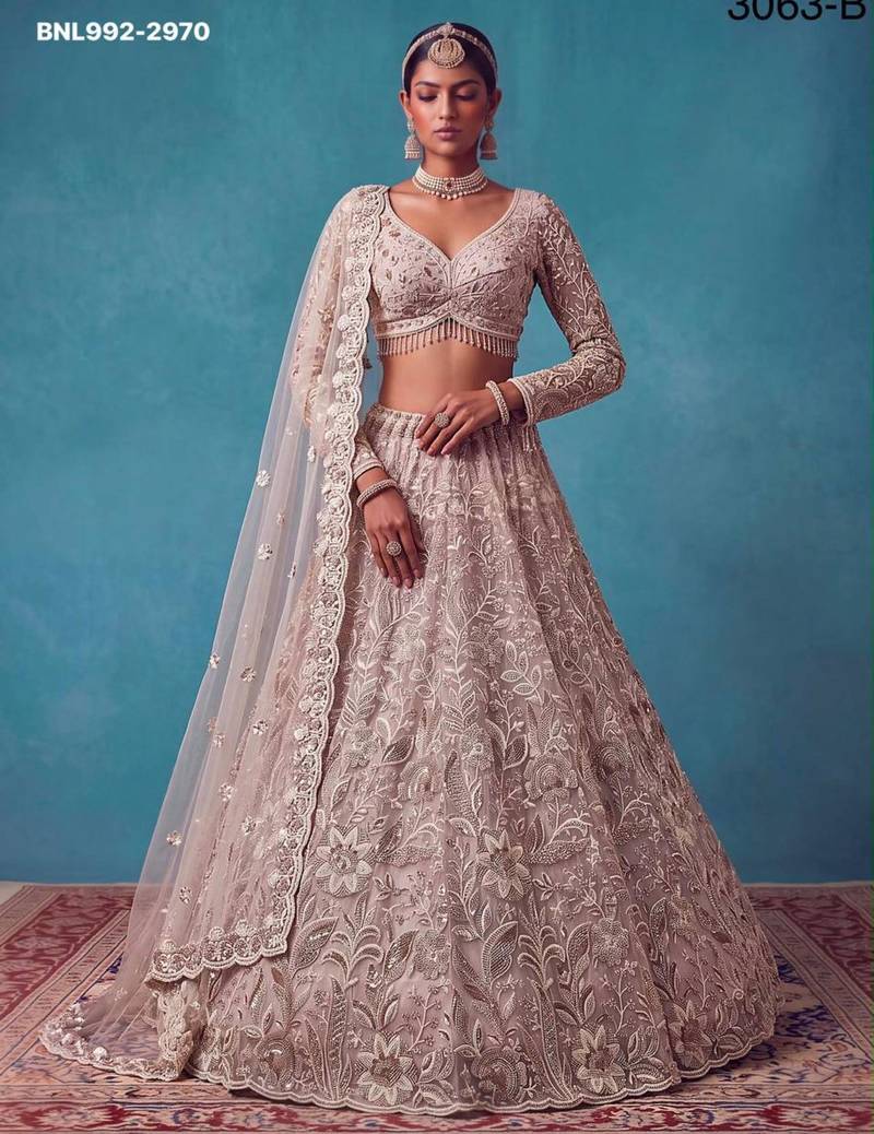 pink net embroidered bridal lehenga choli