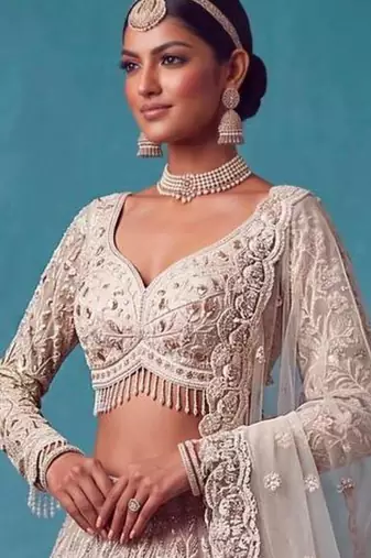 pink net embroidered bridal lehenga choli