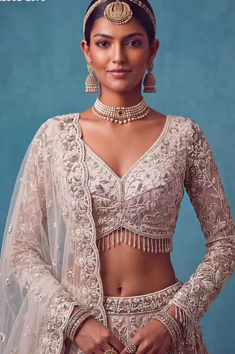 pink net embroidered bridal lehenga choli