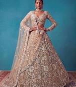 beige net embroidered bridal lehenga choli