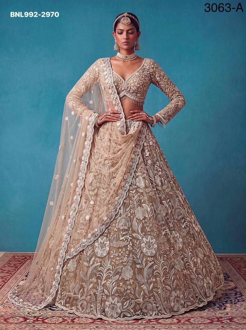beige net embroidered bridal lehenga choli