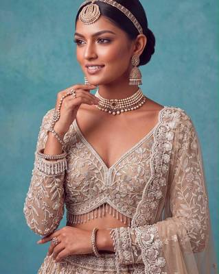 beige net embroidered bridal lehenga choli 2